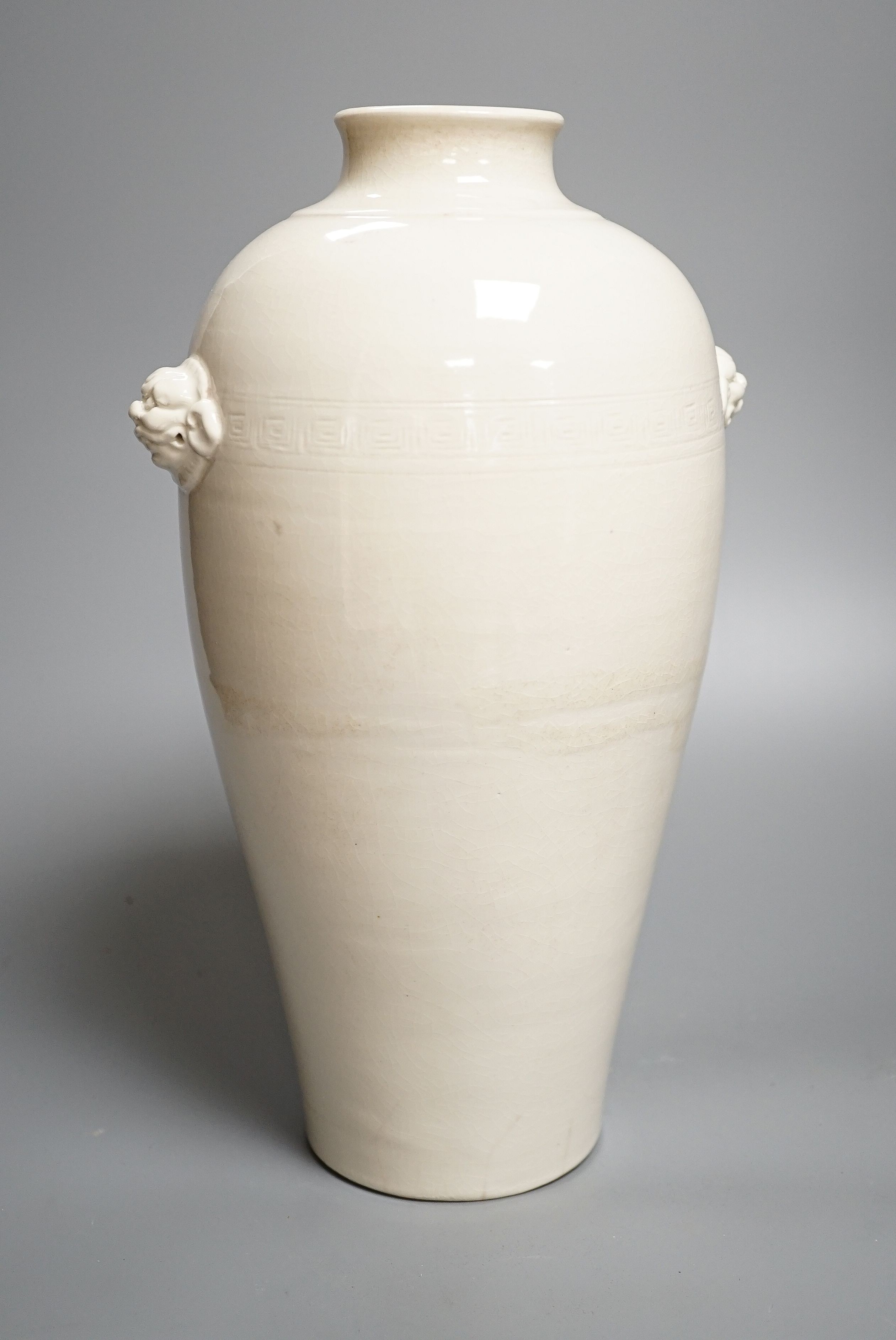 A Chinese crackle glaze blanc-de-chine meiping, Qing dynasty, height 34cm, with 1986 Hong Kong invoice and and Certificate of Authenticity